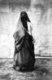 Egypt: A veiled woman, Cairo, c. 1900